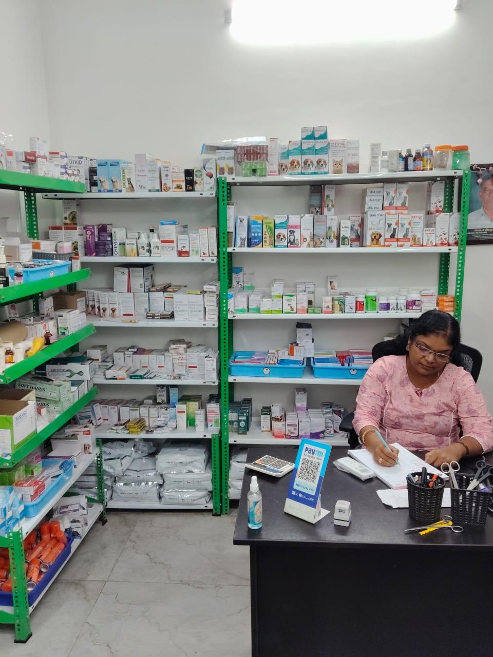 The treatment room at the Maraimalai Nagar branch, with stainless steel tables and an IV stand